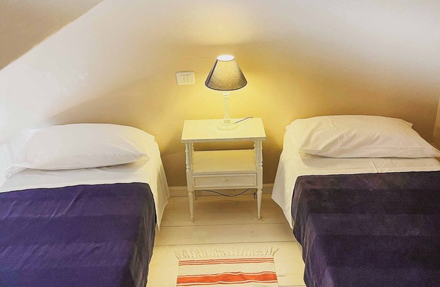"Castle" apartment with one double room and two single beds
