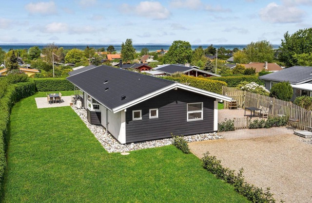Catch a view of the sea from the terrace of this pleasant and bright vacation home.
