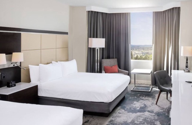 Central and Modern Hotel with Lagoon View! Two Pet-friendly Units, Swimming Pool