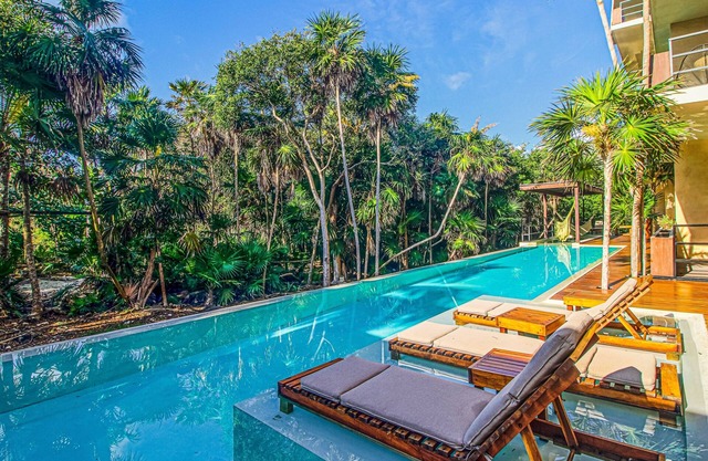 Central apartment with amazing Caribbean views, balcony, beach-view pool, & AC