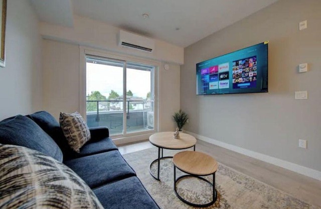 Central Condo with AC and Private Balcony
