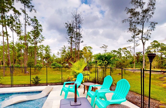 Centrally located home with private pool, firepit, patio, grill, 2 bikes, & AC