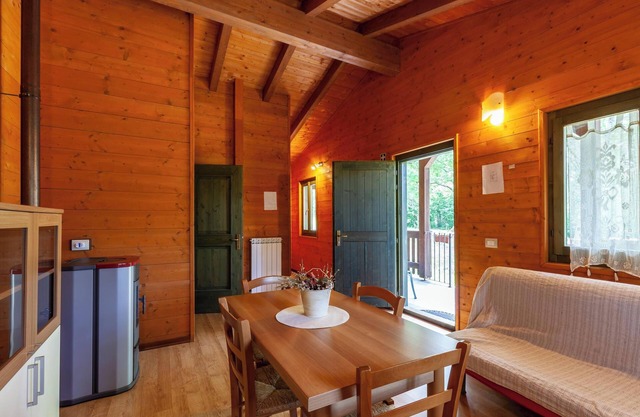 Chalet Anemone - Villaggio Anemone' mit Bergblick und Terrasse