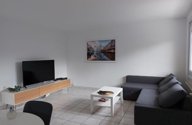 Charmant appartement au rez de jardin d'une maison