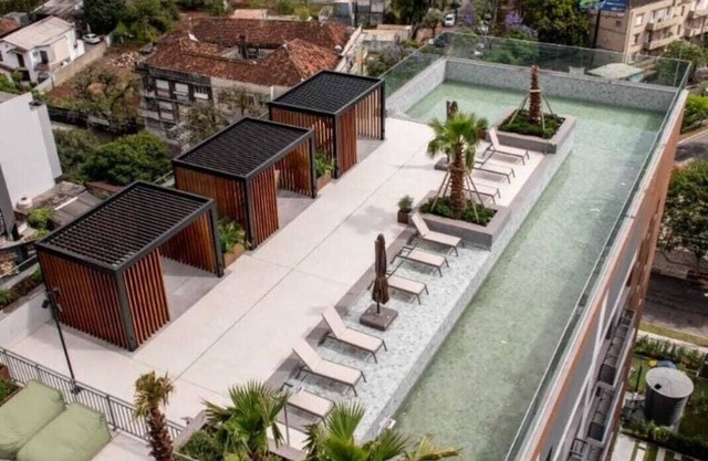 Charming 1-bedroom apartment with AC, WiFi in peaceful Bela Vista Porto Alegre