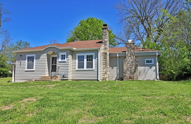 Charming 2-bedroom cottage in scenic Southwest MO with a large corner lot.