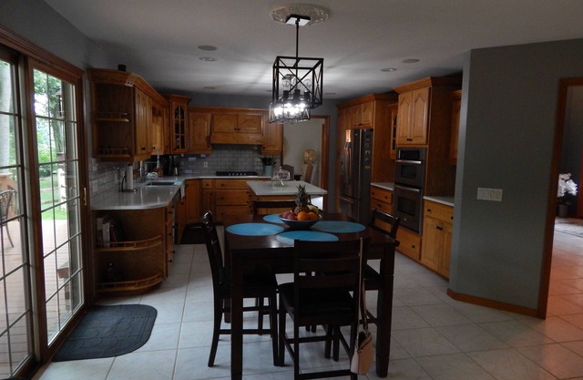 Charming 2-bedroom home with air-conditioned lanai and two car carport,