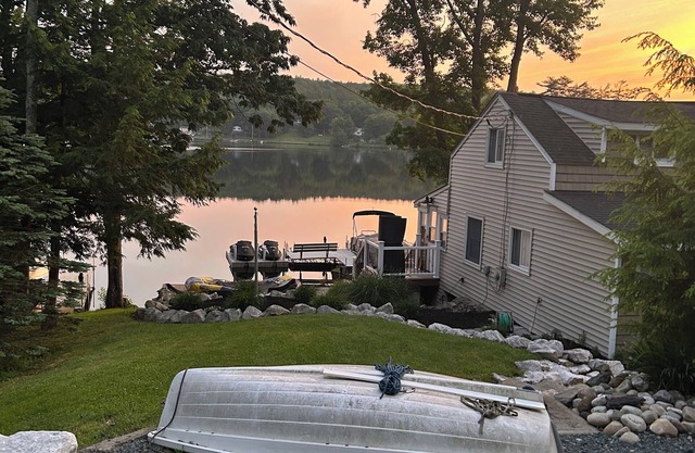 Charming 2-bedroom lake house on Burden Lake with beautiful views.