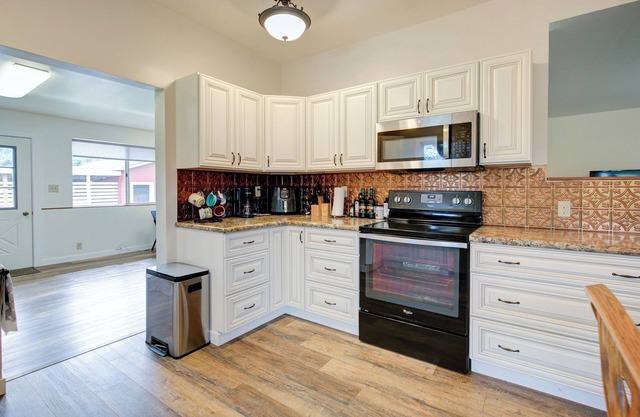 Charming 3-bedroom farmhouse on acreage.