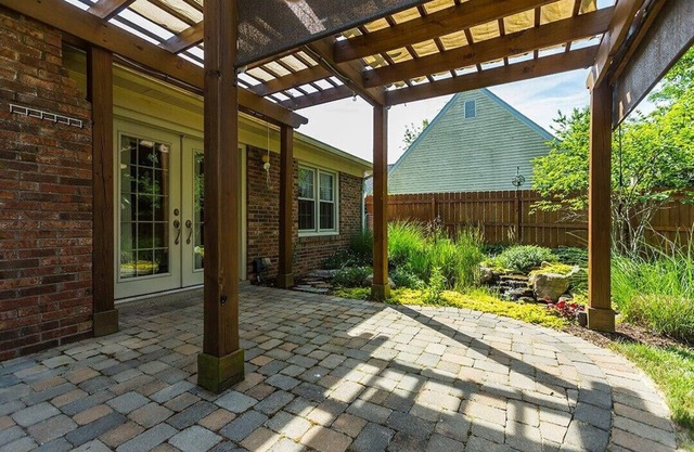 Charming 3-bedroom house with premier back yard space and koi pond