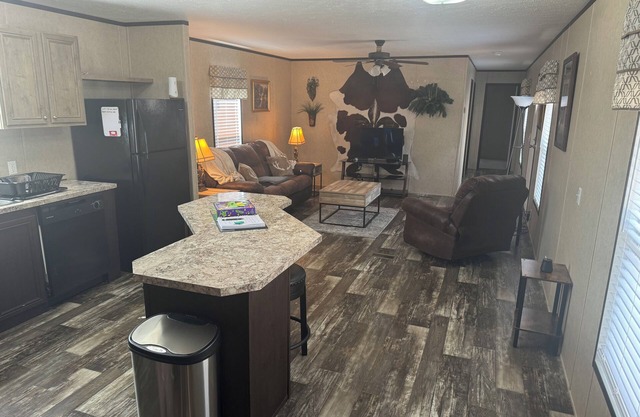 Charming 3-bedroom mobile home in a peaceful country setting.