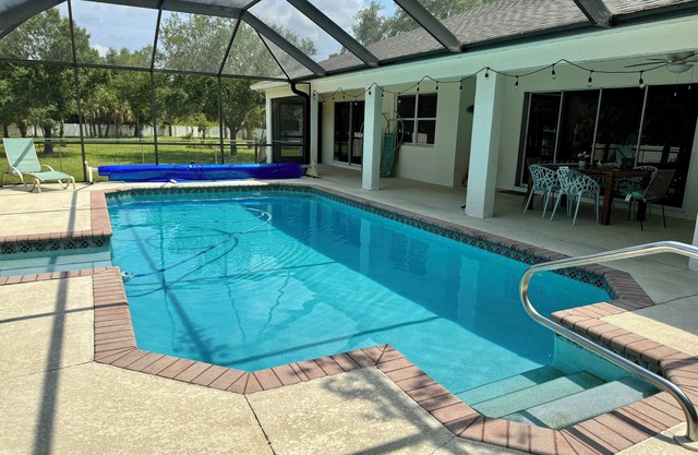 Charming 4-bedroom house in enchanting Lehigh Acres with an amazing pool!