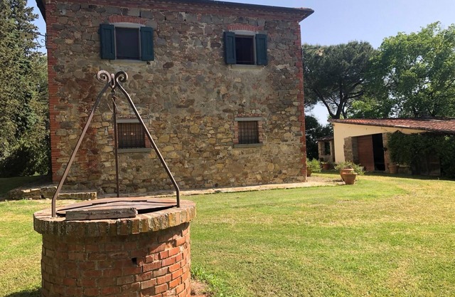 Charming 6-bedroom country house in serene Lucignano with huge pool