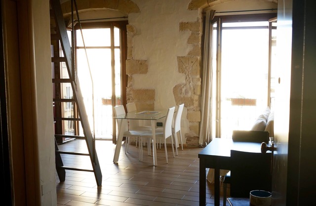 Charming and bright apartment in a 1900 building (wooden roof and stone walls)