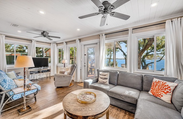 Charming beachfront home with WiFi, central AC, balcony, & deck
