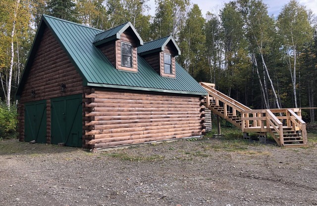 Charming cabin in wonderful New Sweden with 80 acres of woods and trails