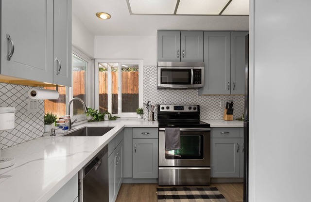 Charming Claremont home near parks and shopping, with open layout and large lot.