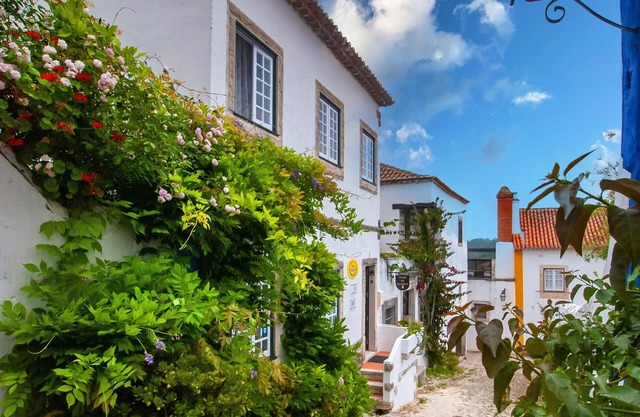Ein verträumtes Haus in den Mauern der Burg von Óbidos