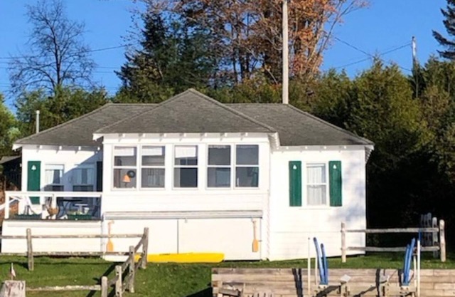Charming cottage on Lake Willoughby w/ sun porch, private deck and dock.