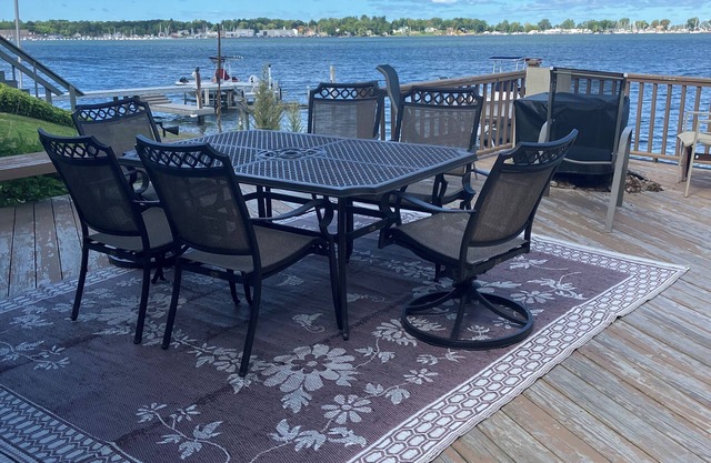 Charming Cottage on the Bay and Golf Course with private patio and boat dock.