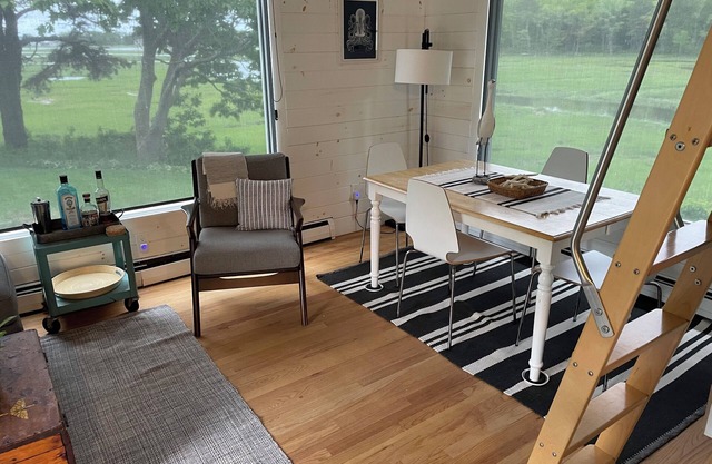 Charming cottage w/ loft on 3 acres of secluded marsh and 7 minute walk to beach