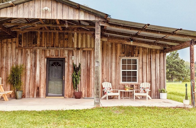 Charming country guest house on 20 acres with a private lake and hobby farm.