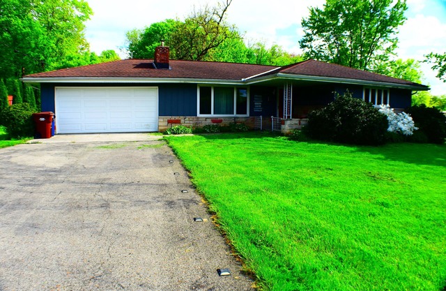 Charming Country Rustic home with upgraded amenities on a full acre.