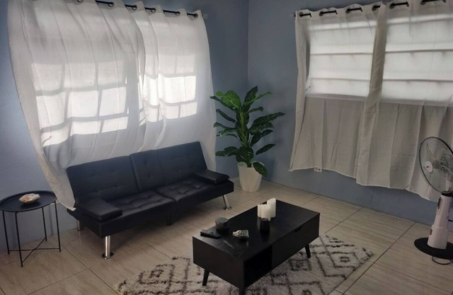 Charming family friendly home,furnished with parking facilities,near malls/beach