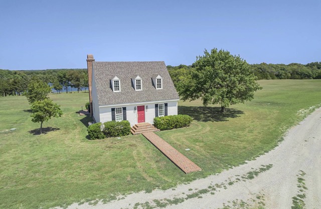 Charming French-Inspired Lakefront Cottage |Acres of Serenity and Scenic Beauty Perfect Getaway
