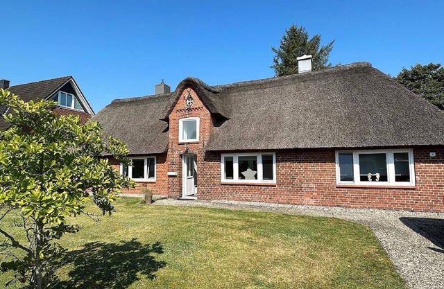 Fresen Hus - Terrasse, eingezäunter Garten, Eckbadewanne, Kamin