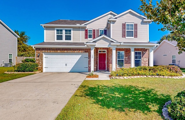 Charming home in great location with fenced yard, AC, & W/D