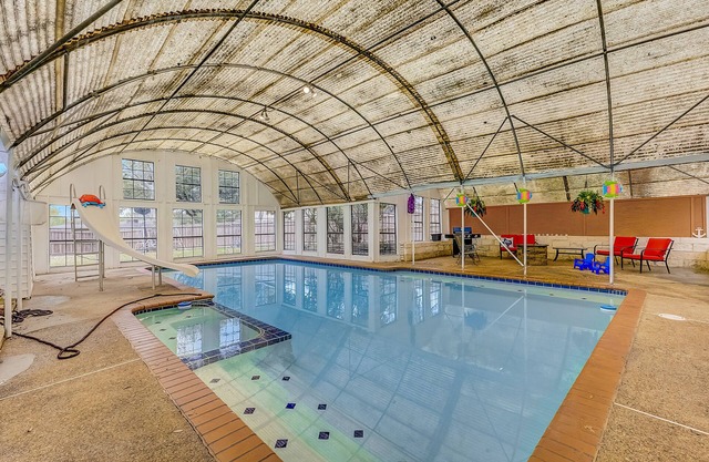 Charming home with private indoor pool, foosball, firepit, and grill