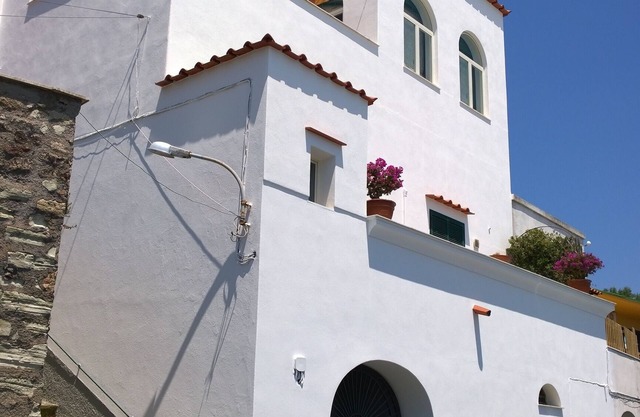 Haus mit Terrasse und Meerblick