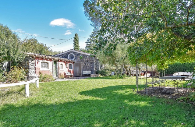 Charming rustic cottage with pool.