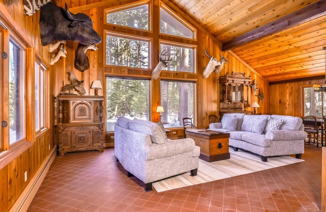 Charming lake view dog-friendly home with fireplace, deck, kitchen, and dock