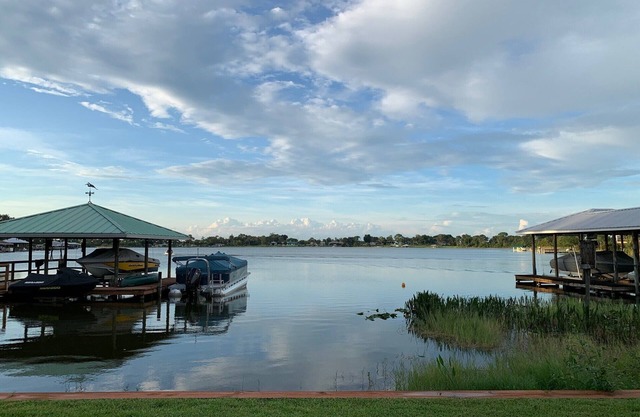 Charming Lake View House on Redwater Lake with dock, gazebo, and hot tub.