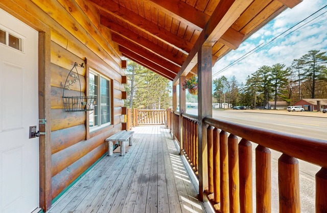 Charming lakefront cabin with fireplace, cozy interior, streaming, & partial AC