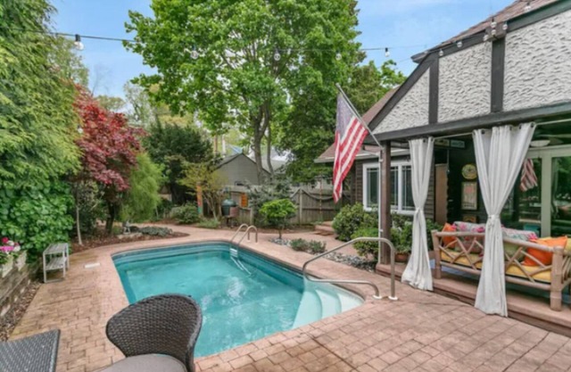 Charming Tudor-Style Home with Ultimate Privacy in the Highlands