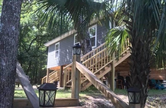 Charming waterfront barndominium on the beautiful spring-fed Chipola River.