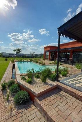 Check and Home - Casa Arenas del Sur - 7 Huéspedes en Barrio Privado