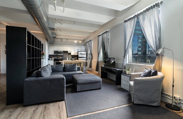 Chic 2-bedroom condo with WiFi, AC Close to Rogers Place in Edmonton