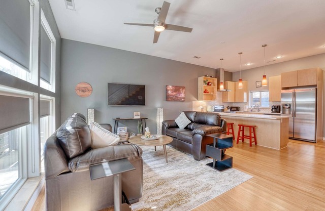 🏈 Chic 2‑BR Condo Walk to Razorback Stadium & Downtown