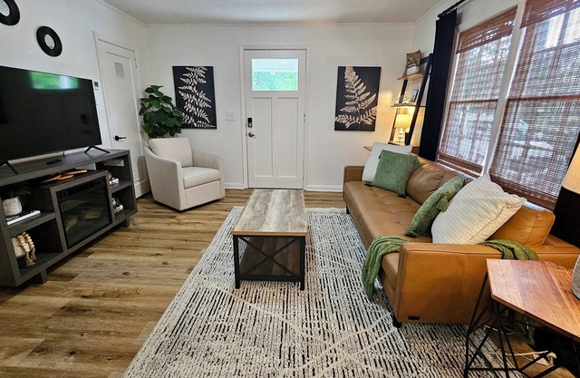 Chic Central Cottage- Wood Floors, Fireplace, Game Room & Firepit- Pet Friendly