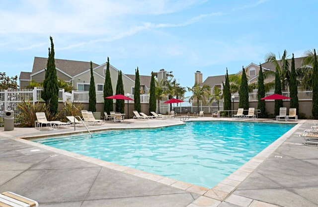Chic Upstairs Condo Steps from Strands Beach