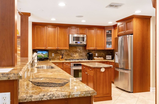 City Oasis is a Gorgeous Home with a Pond, Pool table, Poker, and Heated Pool!