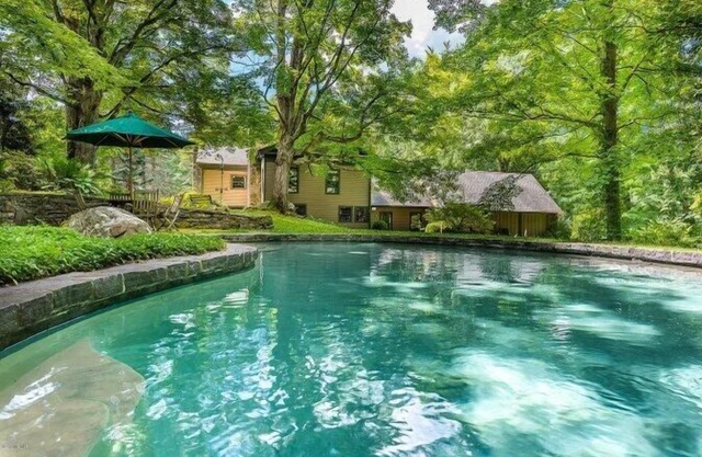 Classic Antique Berkshire Farmhouse with heated pool and modern amenities.