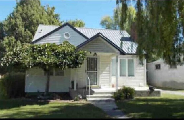 Classic pretty home with nice patio in Rigby.