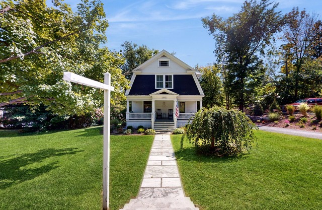 Classic village home with large porch, washer/dryer, cable, grill & partial AC
