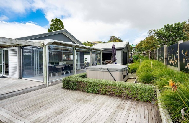 Coastal Charmer - Modern holiday home with multiple covered outdoor entertaining spaces and spa