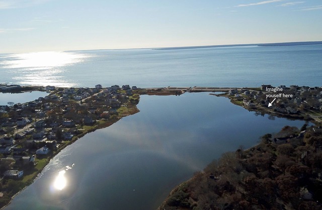 Coastal cottage offers beautiful water views, and steps to sandy beaches